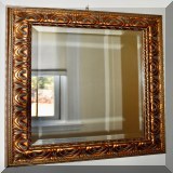 D19. Gilt mirror with beveled glass. 25”h x 22”w - $68 
